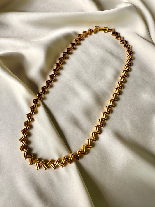 Collar Avon Zig‑Zag Dorado