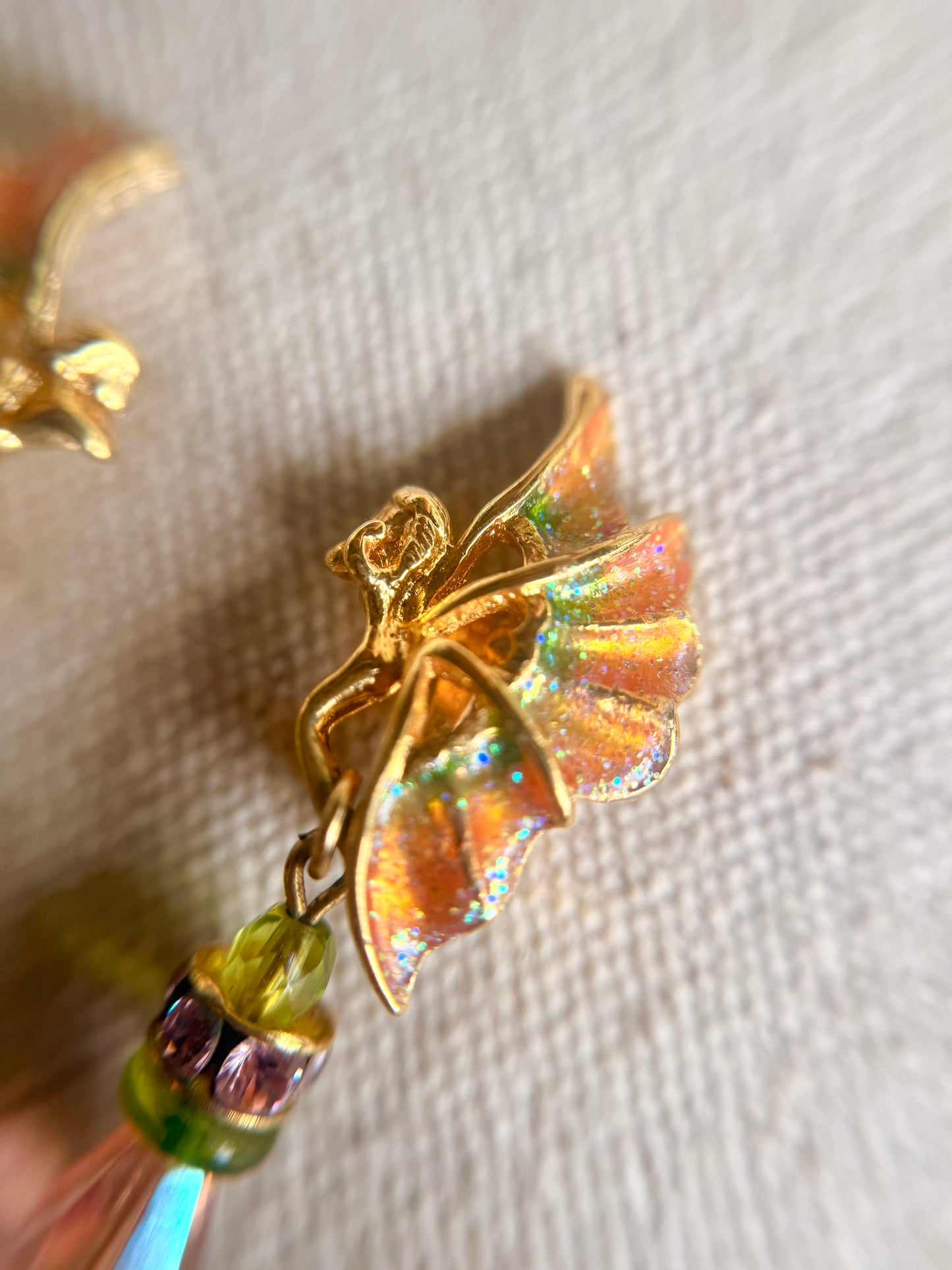 Aretes Pixie con Destellos Aurora- Kirks Folly
