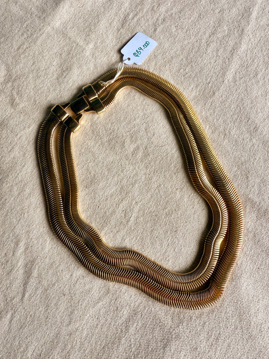 Collar serpentina clásico de- Joan Rivers